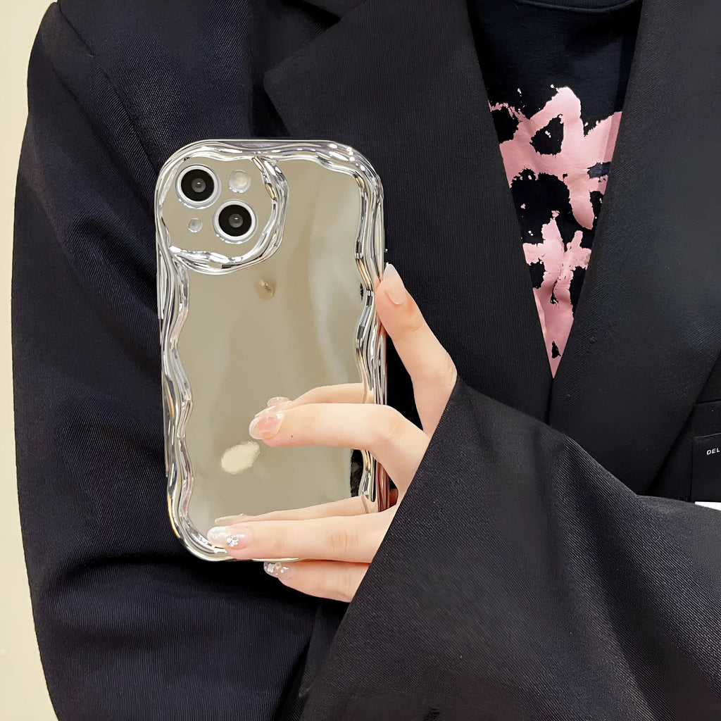Silver electroplated cream grain silicone phone case with bracelet on a white background