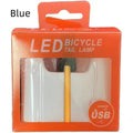 USB-charging waterproof bicycle taillight for night riding shown in blue, pink, red, white and yellow colour options.