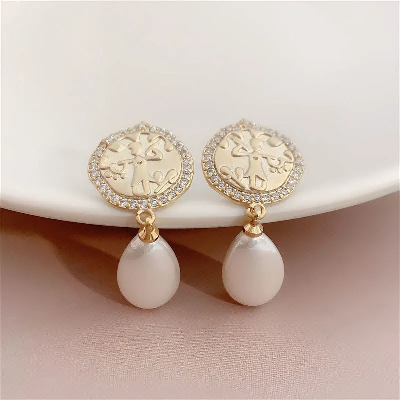Water drop pearl earrings with micro inlaid zircon, copper geometry design and silver needle option