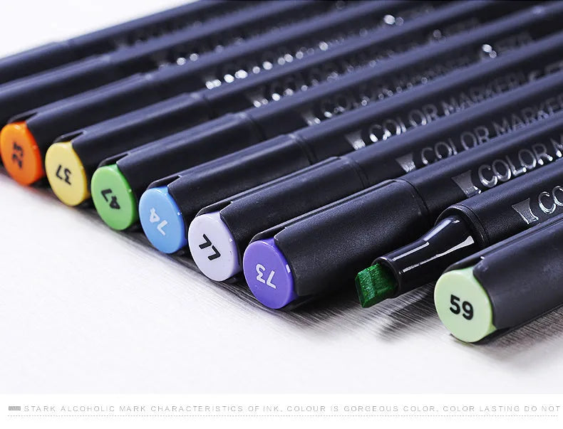 Set of double-headed alcohol marker pens with round and chisel tips for professional art and design work.