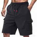 Light grey loose-fit sports cargo shorts made from terry fabric, showing multiple pockets and a casual silhouette.