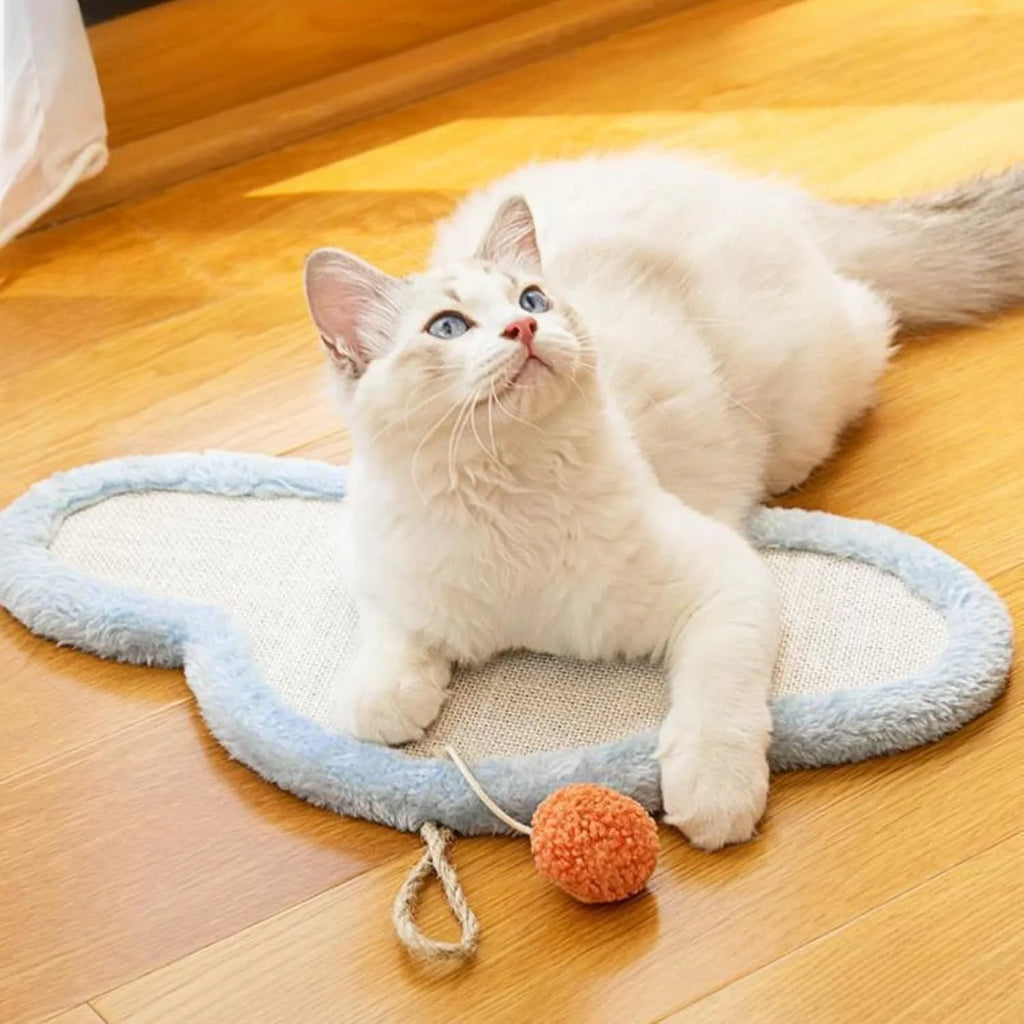 White wall-mounted cat scratching mat with cartoon cat design made from natural sisal
