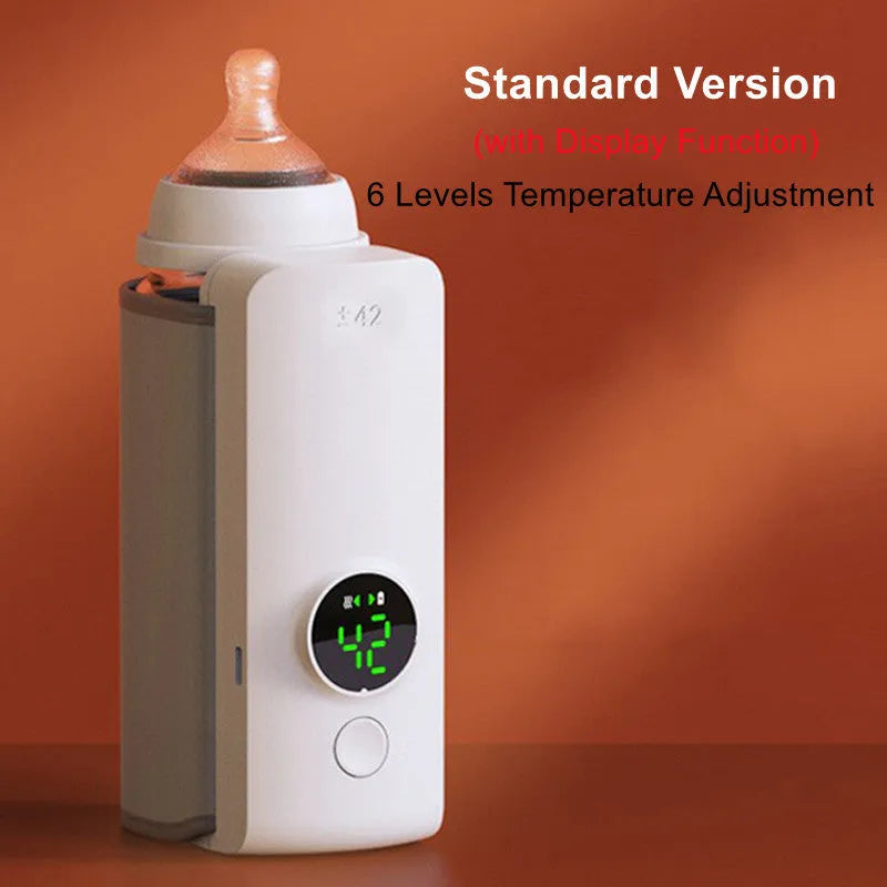 Grey portable baby bottle warmer with USB charging cable and wrap-around heating design