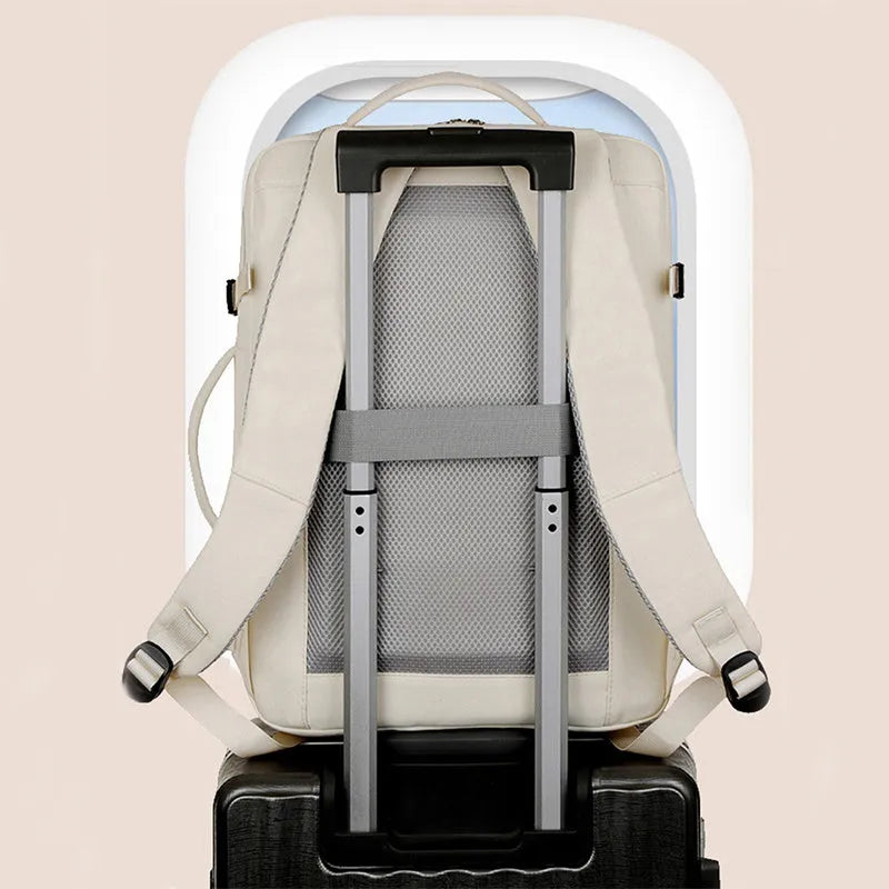 Waterproof Oxford cloth backpack with multiple pockets holding a 15.6 inch laptop