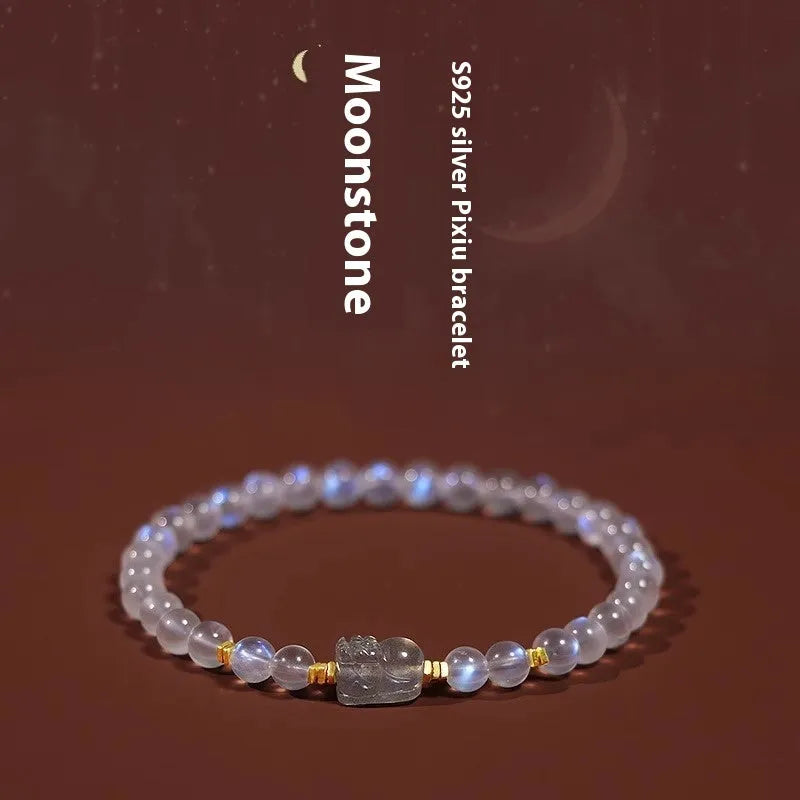 Polished moonstone bracelet with animal/Zodiac design on an adjustable cord for women.