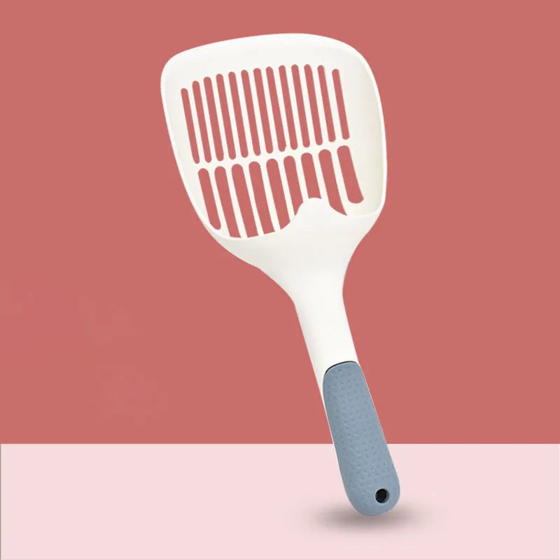Large white plastic cat litter shovel with slotted drainage holes on a 22cm wide scoop