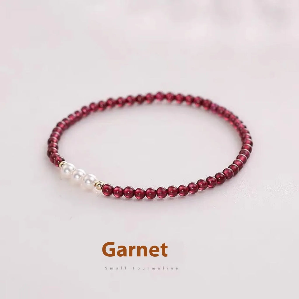 Crystal artificial pearl bracelet with adjustable fastening showing 3mm and 4mm bead size options
