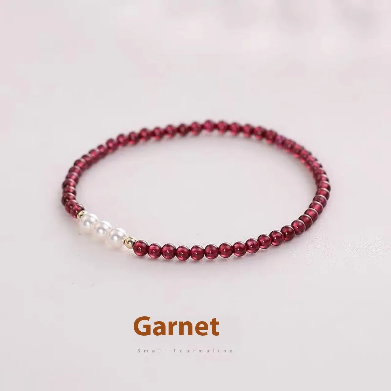 Crystal artificial pearl bracelet with adjustable fastening showing 3mm and 4mm bead size options