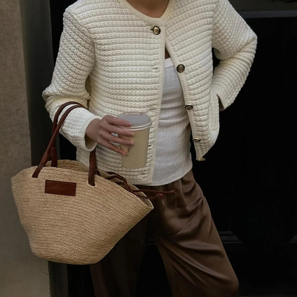 White women's long sleeve button shirt sweater made from polyester, front view