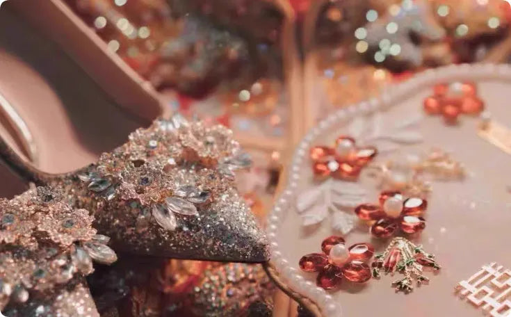 Champagne coloured women's wedding shoes with pointed toe, rhinestone details, and a fine heel.