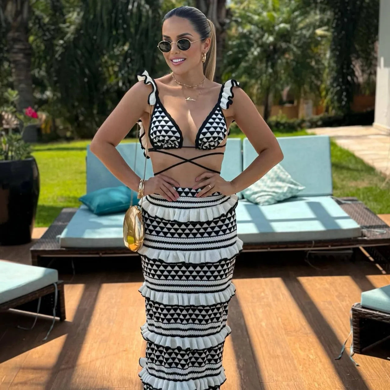 Striped black and white bikini set with ruffled spaghetti straps top and long knitted skirt