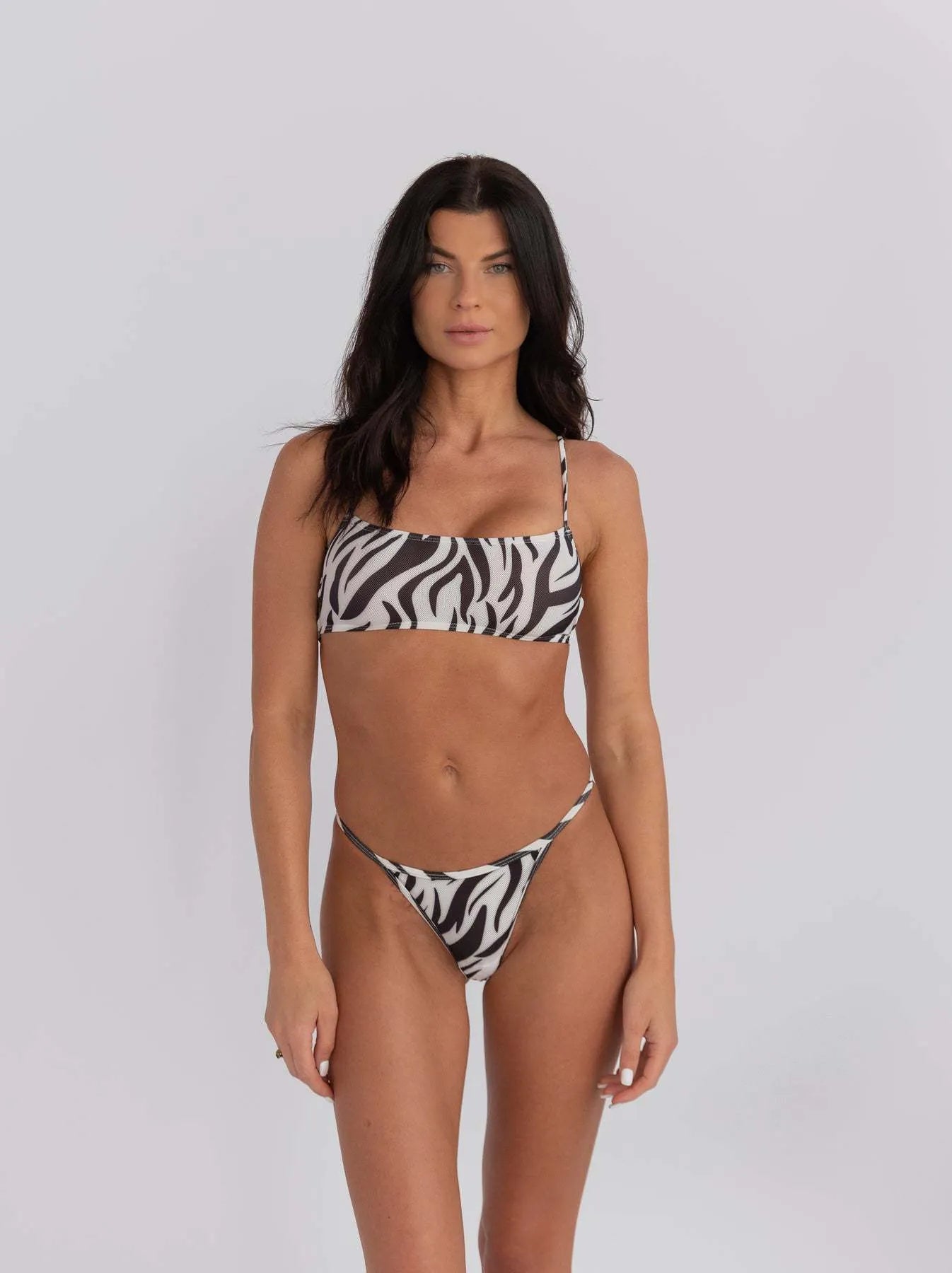 Women's banded bikini swimwear set with stripe pattern on polyester fabric