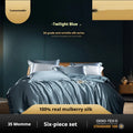 Household Fashion solid colour silk quilt cover set with two pillowcases on a bed