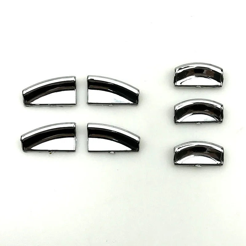 Black ABS plastic decorative sticker for car window lift button on door panel.