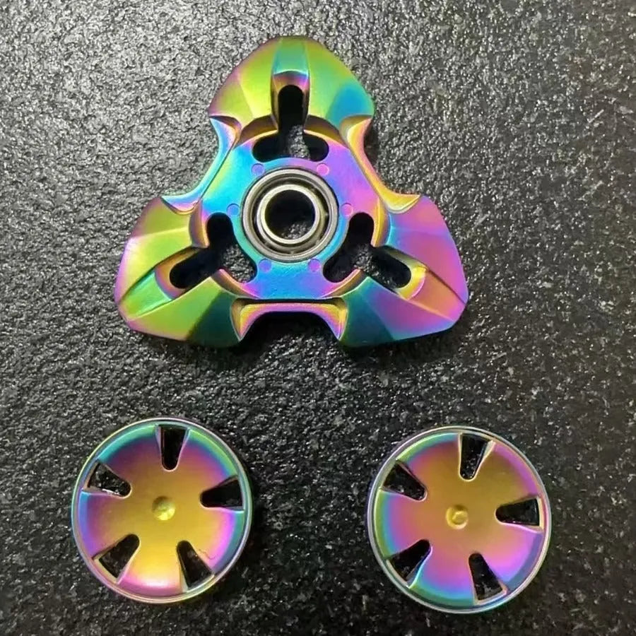 Alloy rotating fingertip gyro decompression toy in gun colour and colourful options