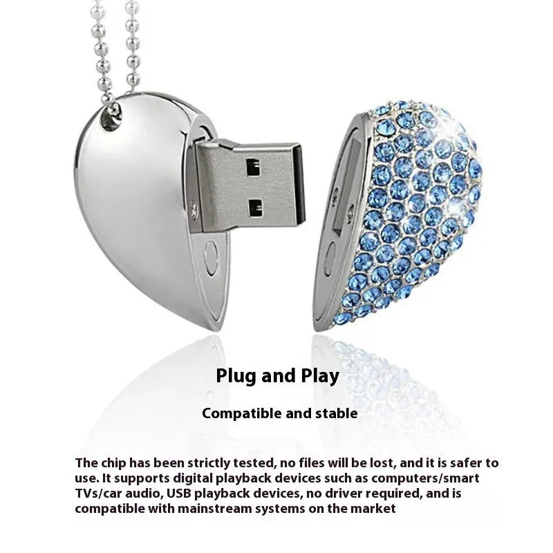 Blue heart-shaped USB flash drive with a textured brick-inlaid pattern on its metal shell.