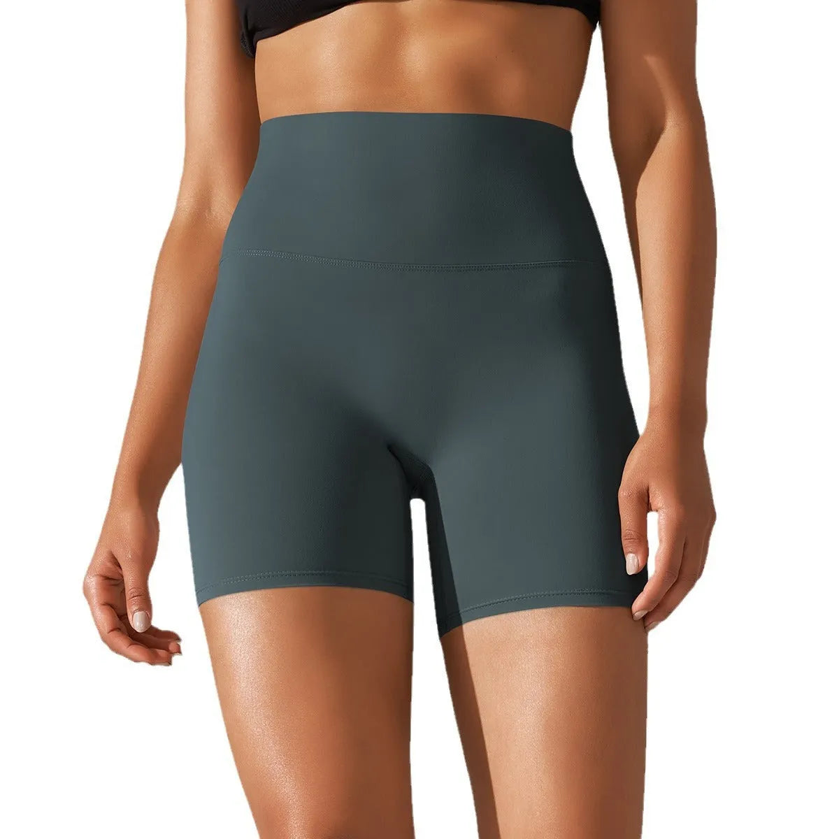 Women's high waist fitness tights in dark green, showing belly control and hip lift design for sports.