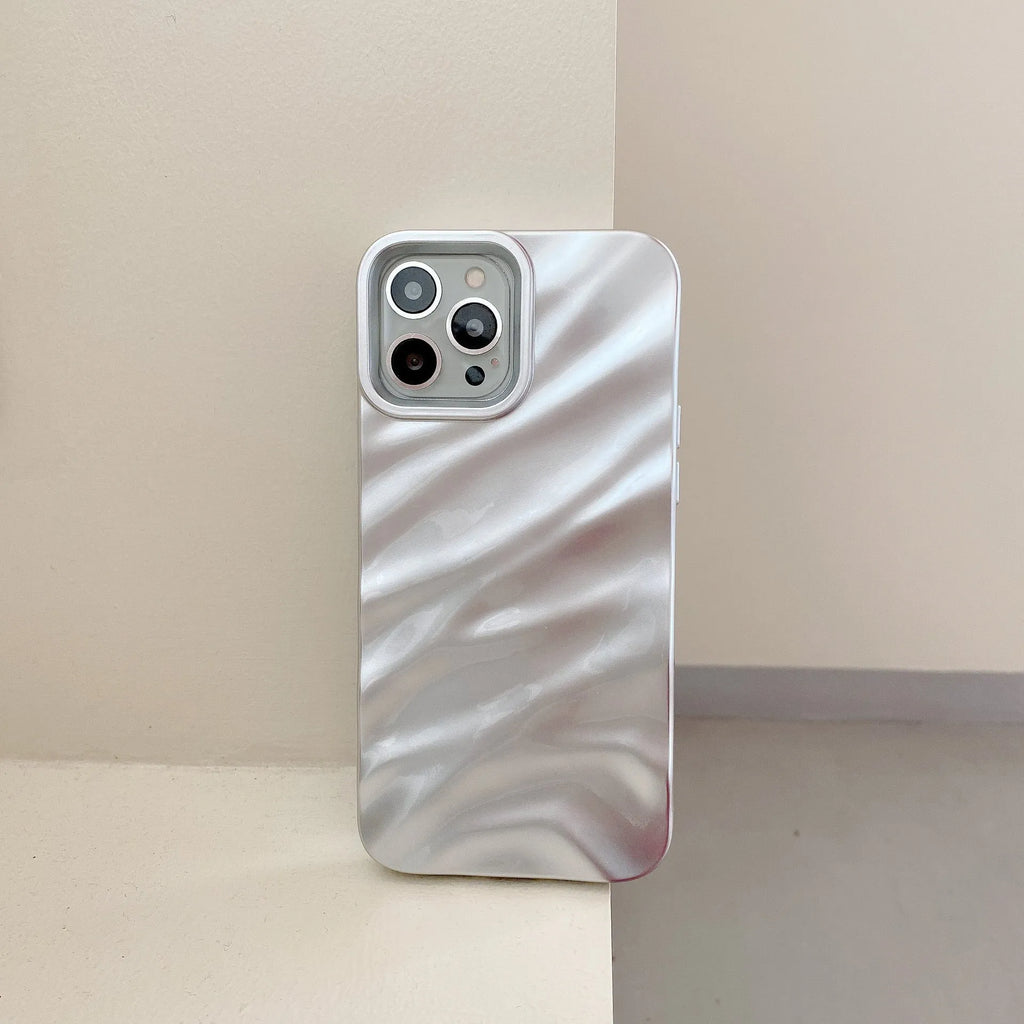 Soft solid colour wave pleated phone case for Apple iPhone 17 on a neutral background