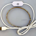 5 metre long flexible USB LED light strip showing touch control and bright white illumination