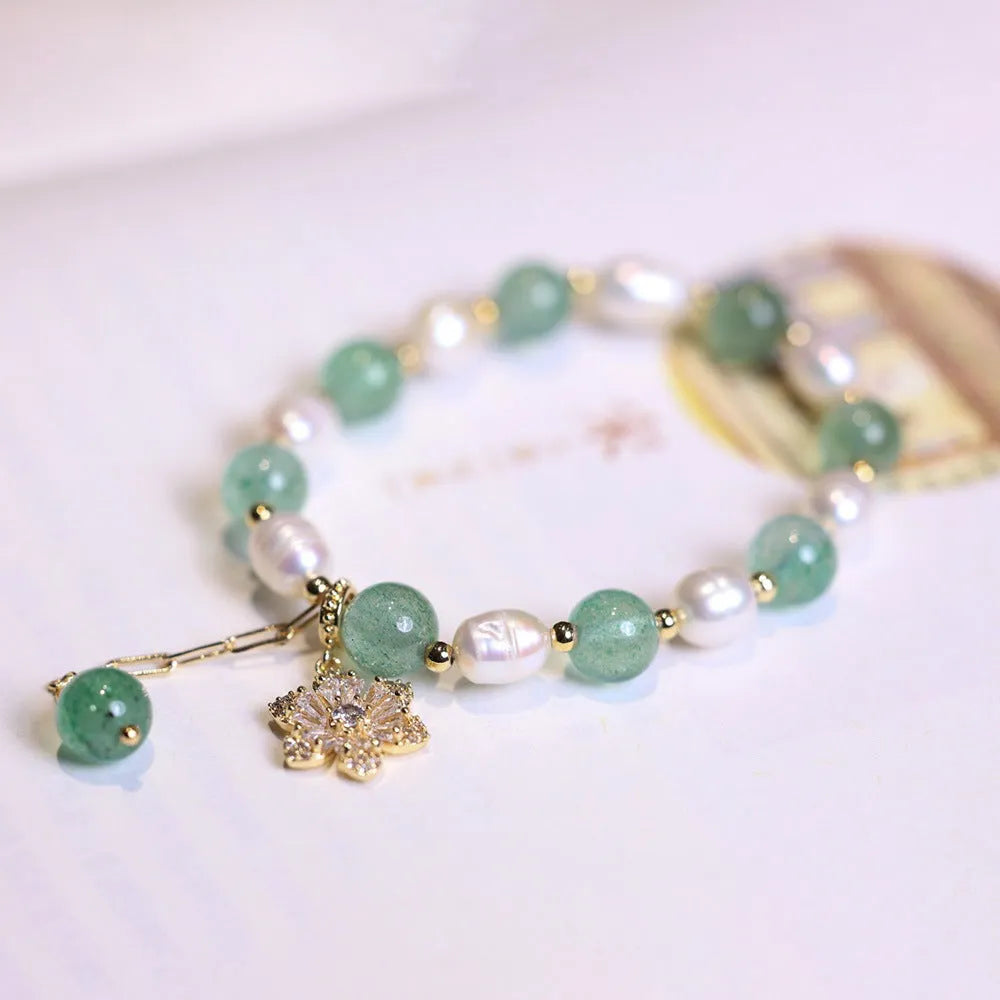 Green freshwater pearl bracelet with geometric strawberry beads and Chinese knot closure