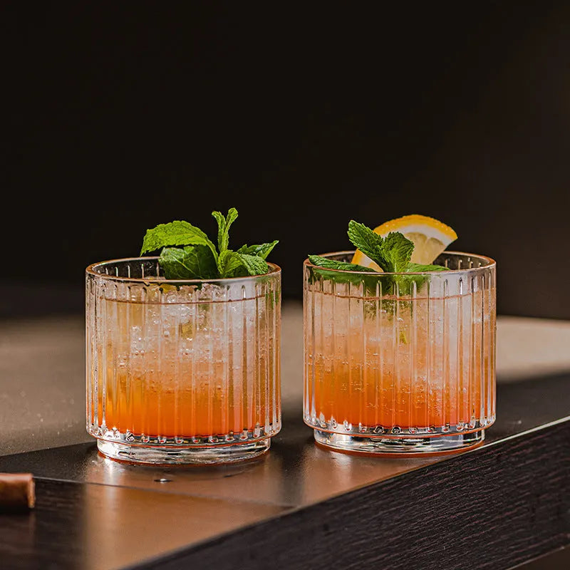 Modern simplicity clear glass whiskey cup with diamond pattern on a table, single piece