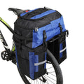 Rhinoceros green 70L bicycle rear storage frame bag mounted on a touring bike.