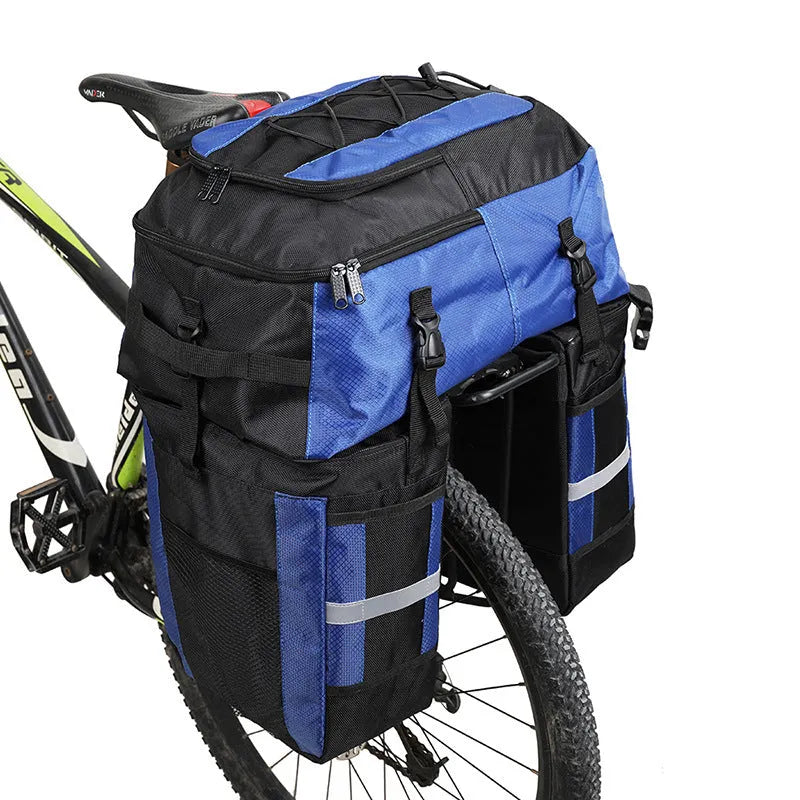 Rhinoceros green 70L bicycle rear storage frame bag mounted on a touring bike.
