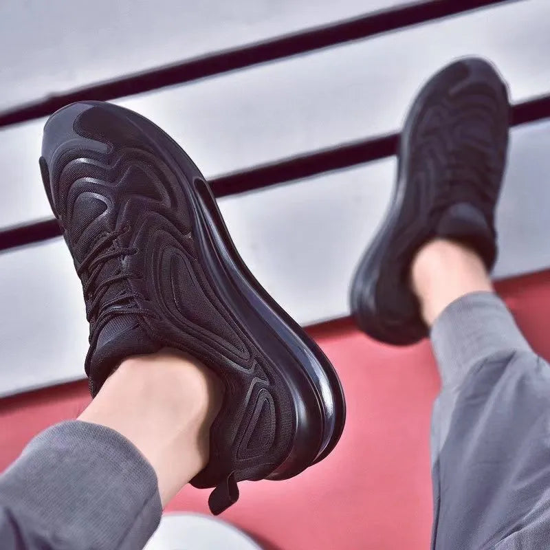 Men's black air cushion casual sneakers with lace-up front and thick sole