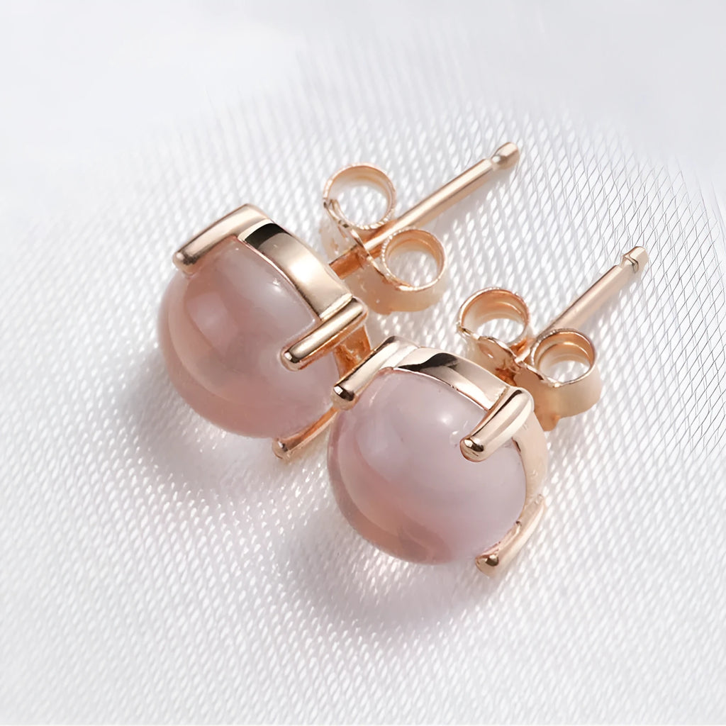 Women's rose gold synthetic ross quartz stud earrings with drop shape Korean style design