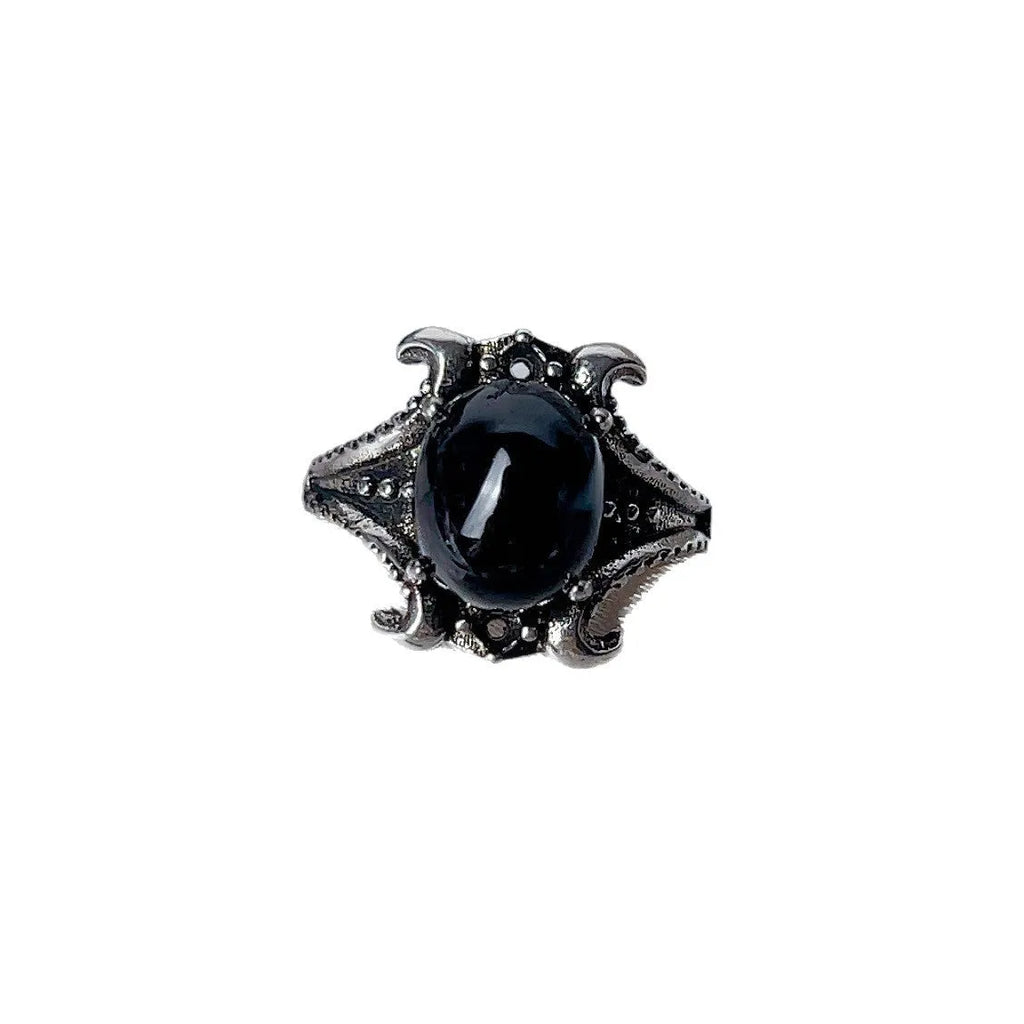 Copper open ring with crystal inlay, geometric shape, black tourmaline colour, on white background