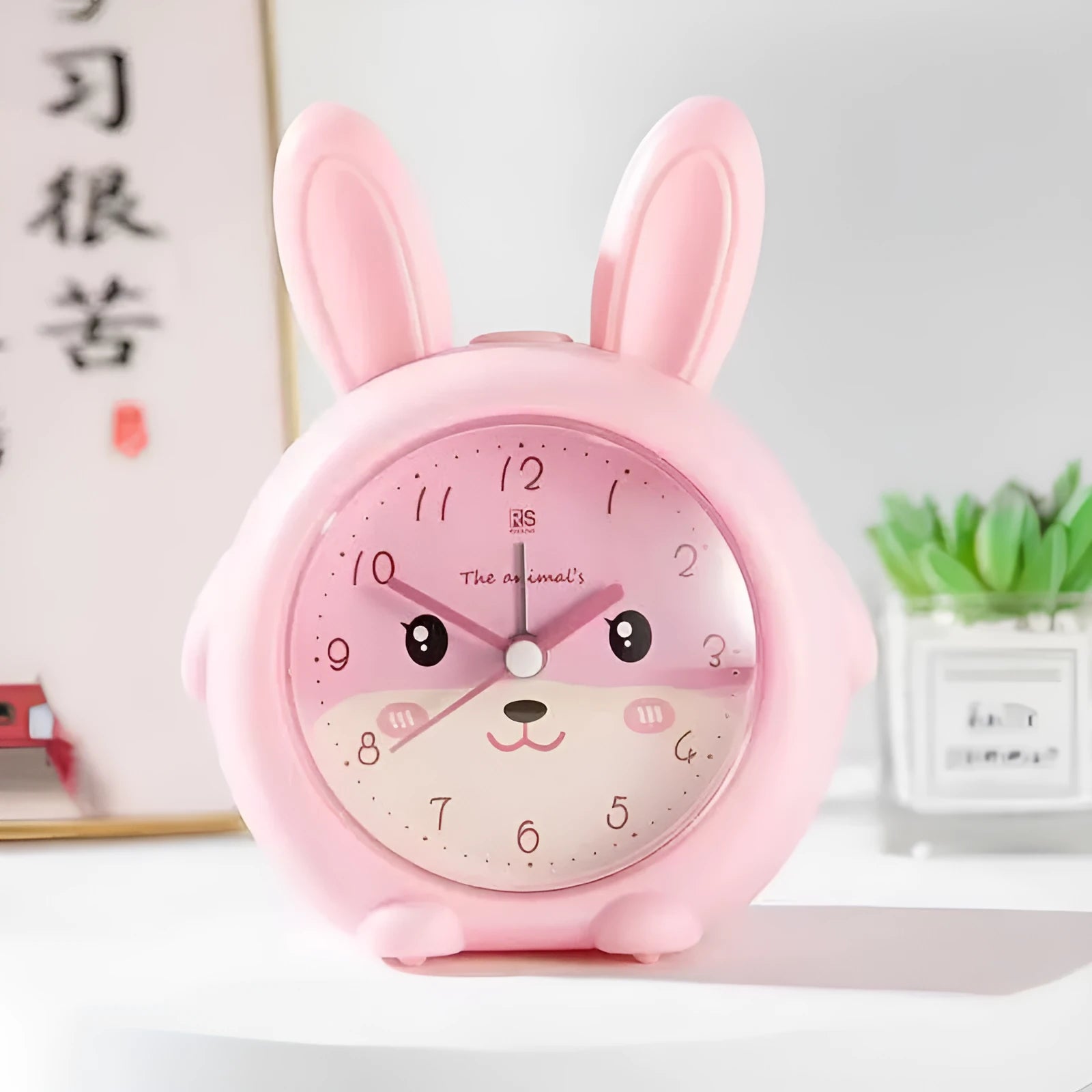 Children's cartoon alarm clock with night light in pink or blue colours, 6.5cm thickness