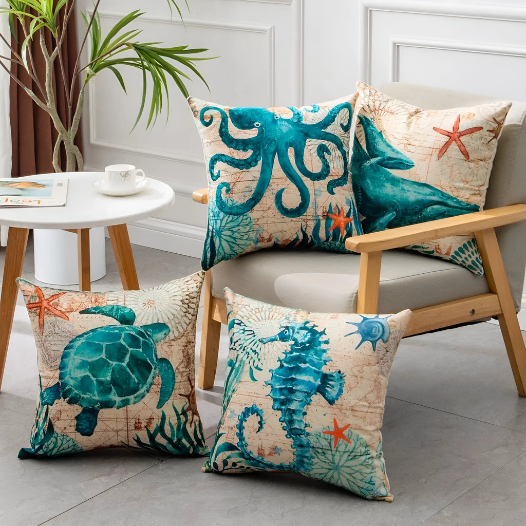 Linen cushion cover with detailed sea turtle print, measuring 45x45cm, on a sofa.