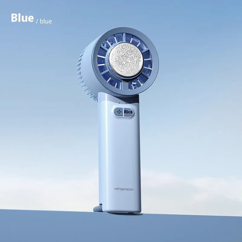 White handheld turbo jet fan with brushless motor and ice cooling function showing compact design