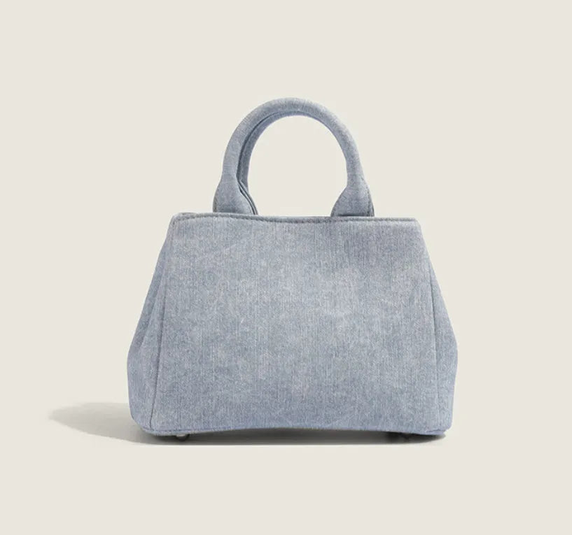 Women's soft PU commuter shoulder bag in denim blue or white with standard size and polyester lining