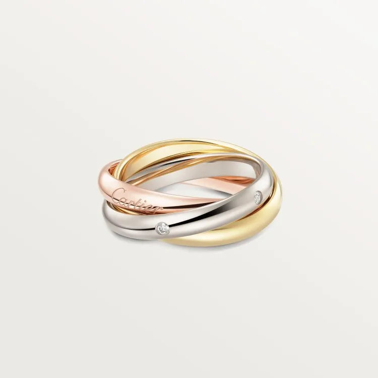 Set of three sterling silver rings with full band of diamonds, showing gold rose and silver black finishes on a geometric U-shaped profile.