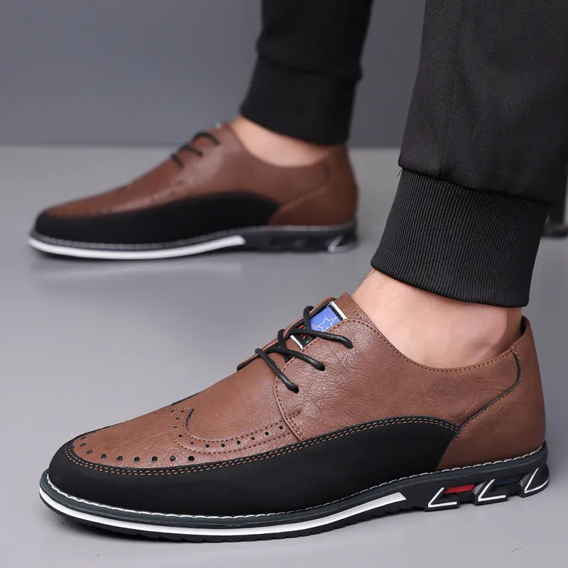 Men's black leather casual shoes with a rubber sole and sewn detail on the fabric upper.