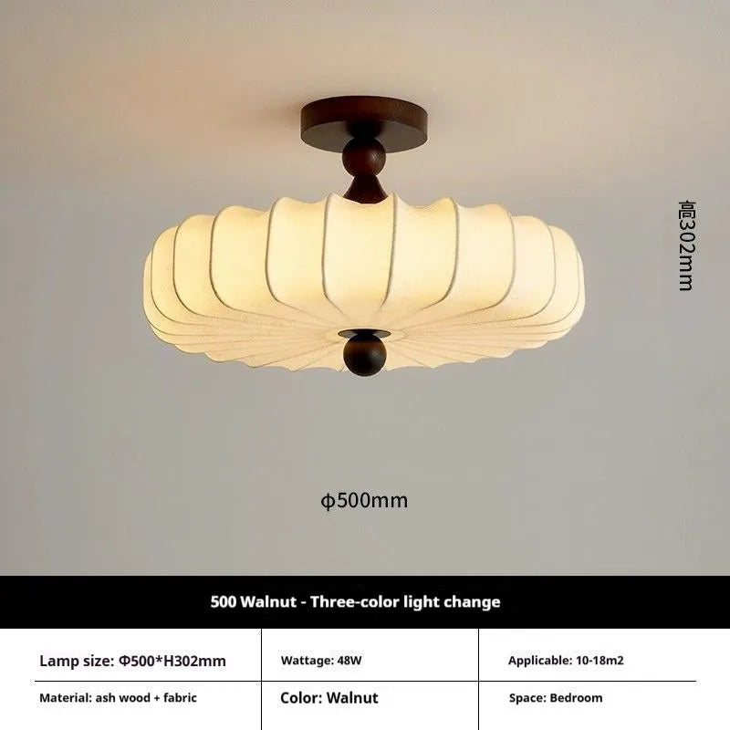 Mid-ancient French retro fabric ceiling lamp with ash wood frame in walnut colour on a ceiling