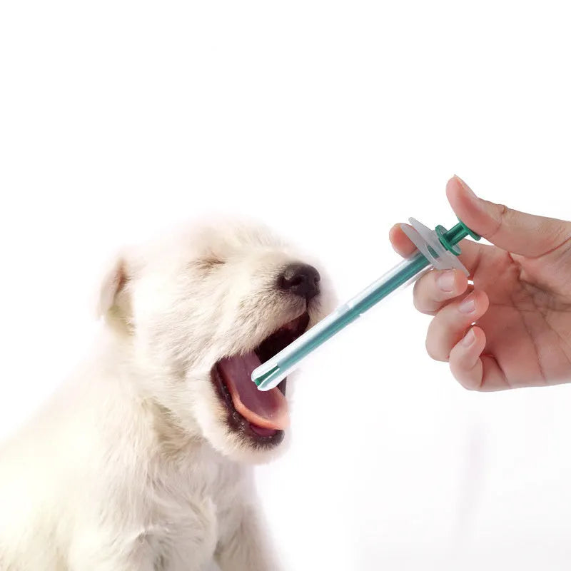 Two pet pill shooters with soft silicone tips for administering tablets to cats and dogs