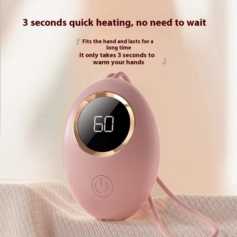 Compact hand warmer power bank with digital display in pink and other colour options.