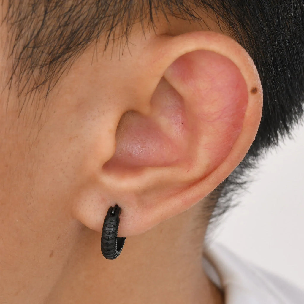 Stainless steel snake pattern stud earrings in black and gold colour options