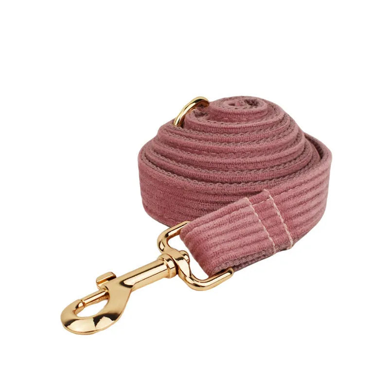 Corduroy dog collar and leash set with matching vest, bow, and poop bag holder in multiple sizes