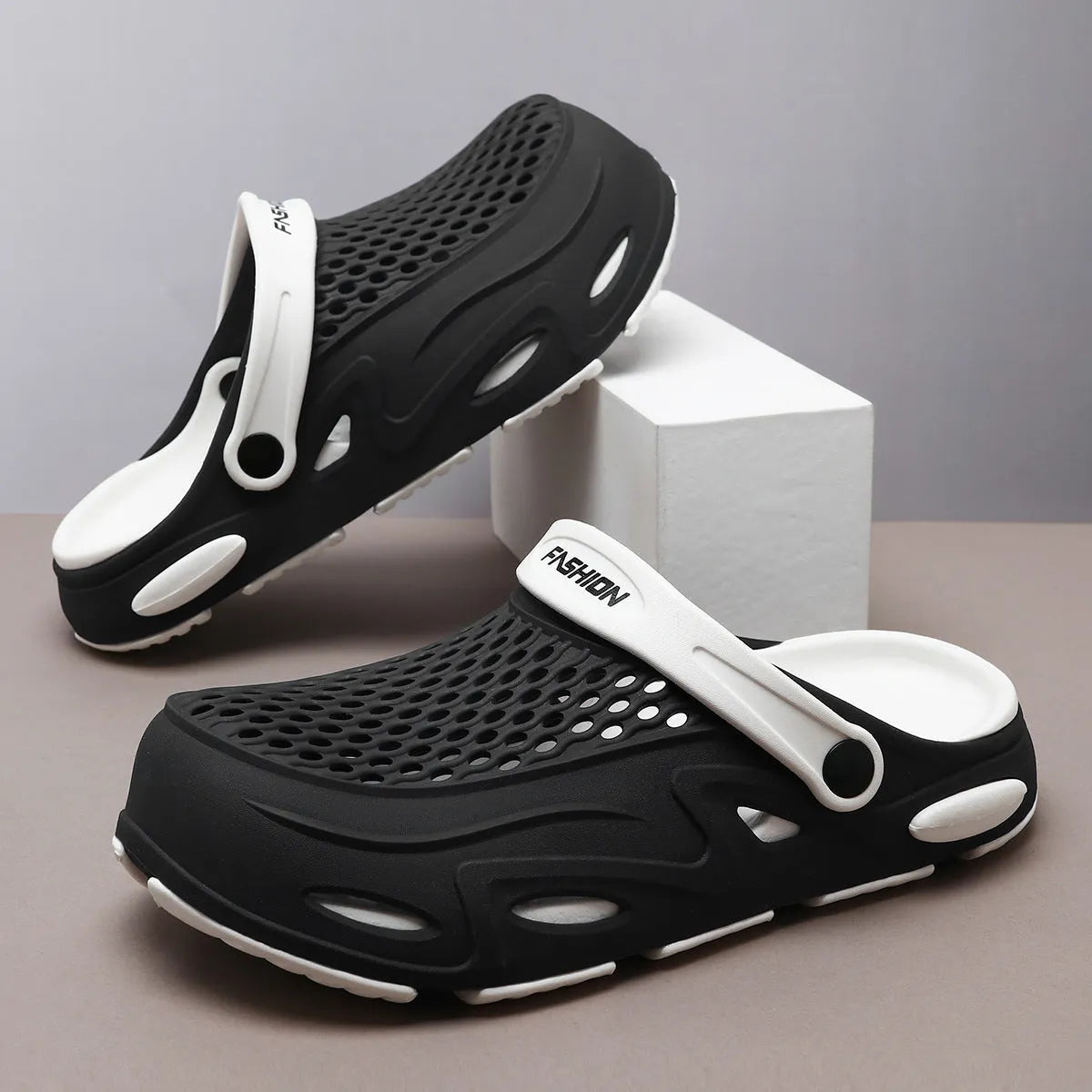 Men's grey closed toe beach slippers with a grid pattern and non-slip EVA sole.