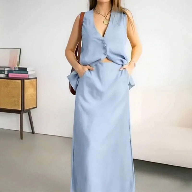 Women's casual sleeveless vest and long skirt two-piece suit in blue, yellow, or white polyester.