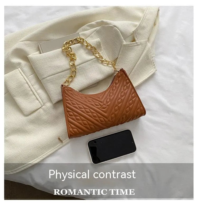 Brown pleated chain shoulder bag with square shape and adjustable metal strap