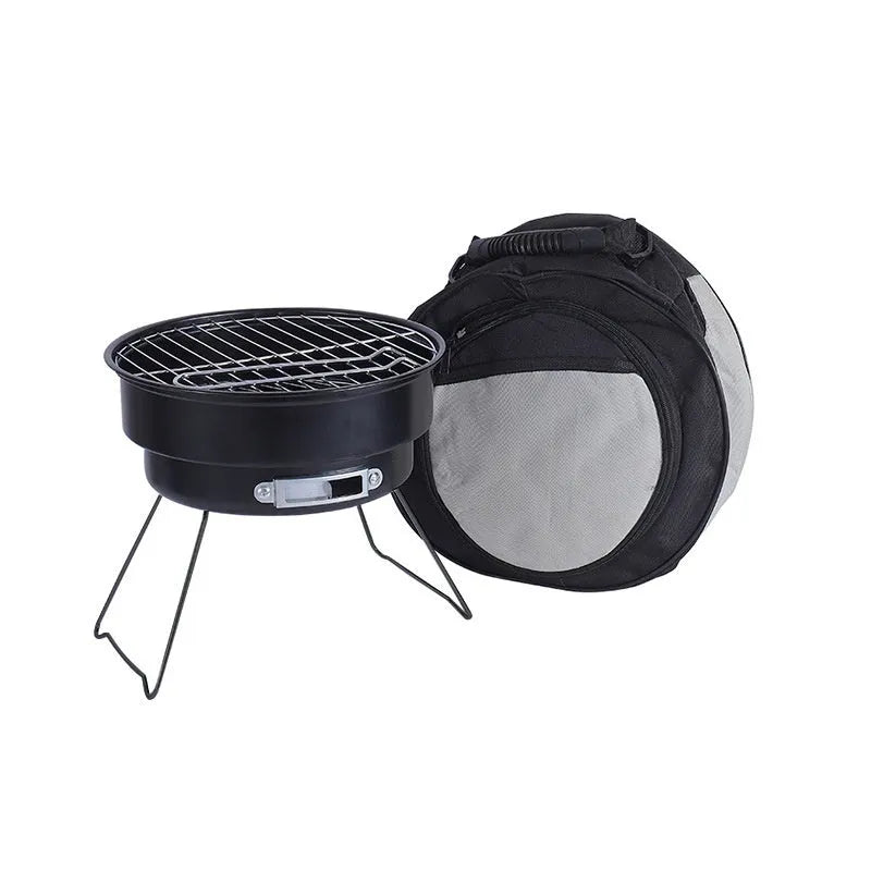 Small round folding charcoal barbecue grill stove with detachable leg and mesh, packed in a carry bag.