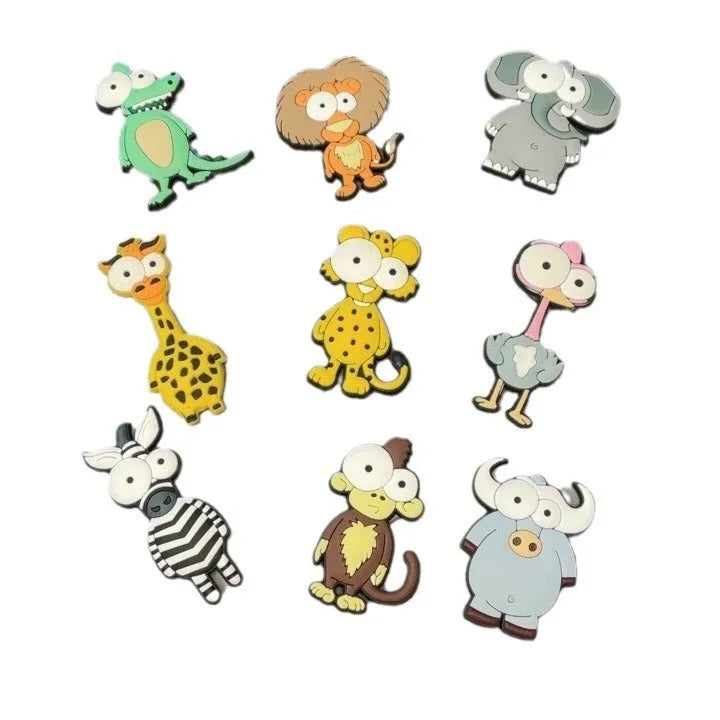 Set of nine PVC cartoon animal refrigerator stickers including monkey, crocodile, leopard, lion, and giraffe in assorted colours