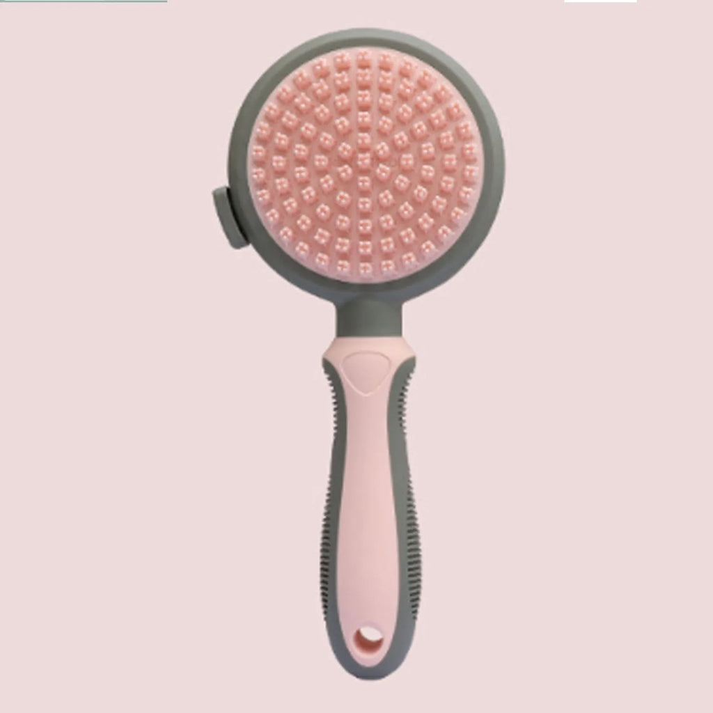 Double-sided cat grooming brush with slicker brush on one side and flea comb on other, showing release button mechanism