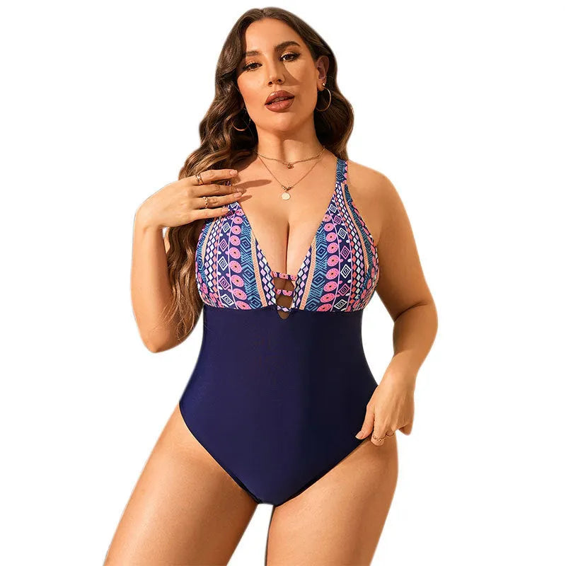 Leopard print plus size one-piece swimsuit for women with V-neck and conservative belly coverage design.