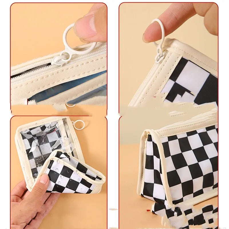 Transparent PVC pencil case with a chessboard grid pattern, showing pens inside, next to a red and white plaid version.