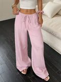 Women's black wide-leg trousers with a front lace-up detail on the mid-rise waistband.